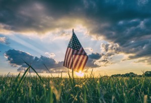 American Flag in a field of grass.