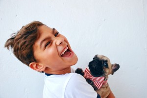 A Boy and a Puppy Laughing
