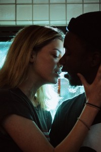 Couple Kissing in the Dark