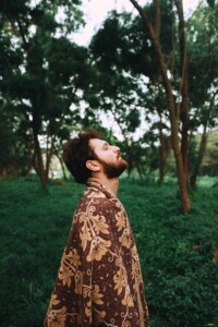 Man Breathing in the Woods