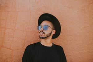 Man Staring into Distance on Wall