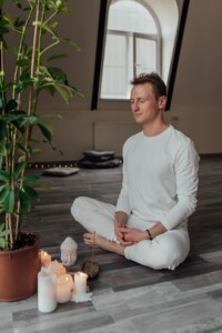 Person Meditating in a Room