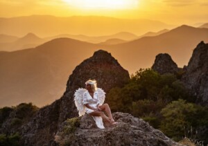 Angel on Mountain at Sunset