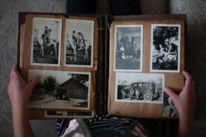 Holding a Book of Photos