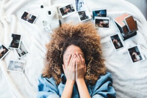Person Surrounded by Photos