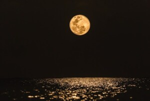 A Full Moon Over the ocean