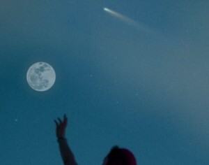 Raising a Hand to the Full Moon