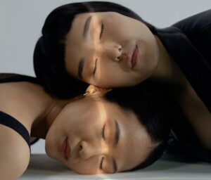 Two Heads Eyes Closed