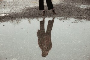 Person Reflecting in the Water