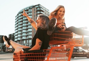 Close Friends Having Fun in a Shopping Cart