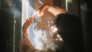 Hands Flowing through smoke and light
