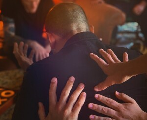 Hands on Someone's Back