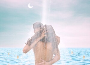 Couple Hugging in the Ocean