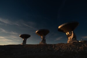 3 Radio Dishes in the Sunset