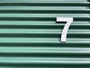 Number 7 on a Steel Corrugated Wall