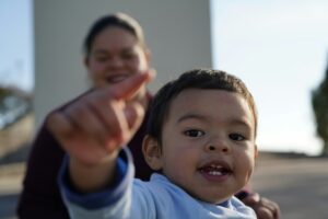 A kid pointing at you